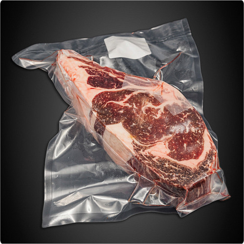 <Стейк Рибай на кости  <br> Праймбиф  (Dry Aged Primebeef)